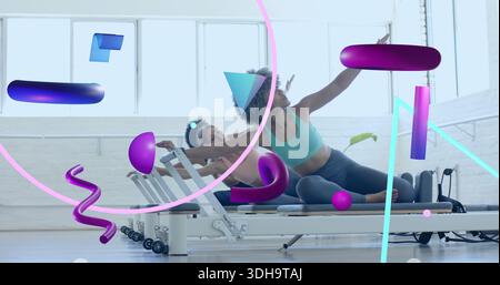 Leaning woman in teal sports bra and dark leggings doing side-stretch on reformer, neon overlays Stock Photo