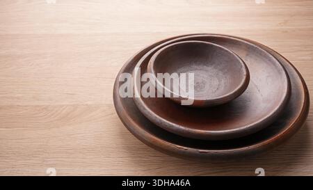 Empty round clay plate, Indonesian pottery Stock Photo