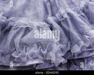 Skirt blue gray tulle fabric with frills. Stock Photo