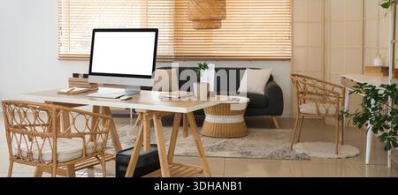 Interior of living room with programmer's workplace Stock Photo