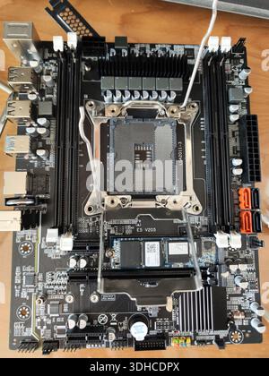 Close-up of a computer motherboard with CPU socket and components Stock Photo