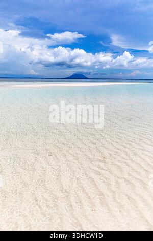 Spectacular white sandbank near Nain island north from Bunaken island in Sulawesi, Indonesia, idyllic landscape, coral reef, patterns in a sand Stock Photo