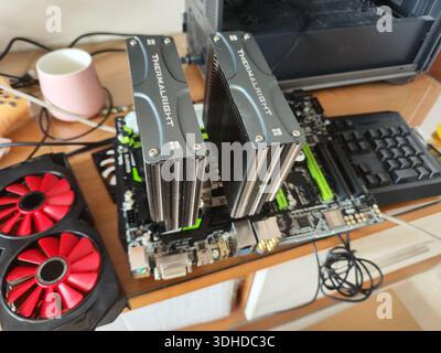 Overclocking Setup with Thermalright CPU Coolers on Motherboard Stock Photo