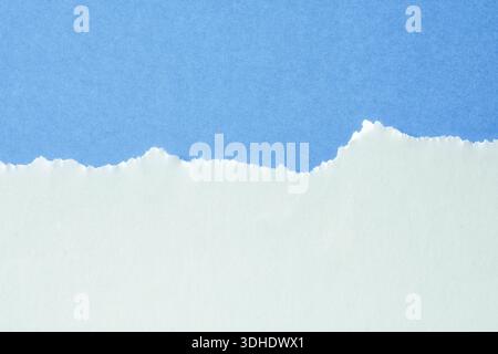 blue and white color torn paper background, top view Stock Photo