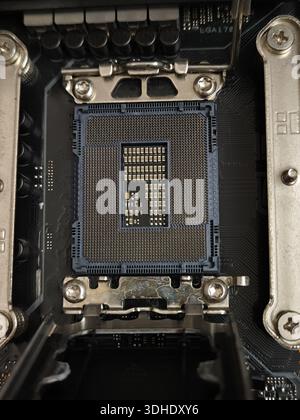 Close-up of CPU Socket on Motherboard with Thermal Paste Residue Stock Photo