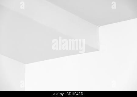 An abstract composition of interlocking white planes and clean lines. The image emphasizes geometry, balance, and minimalism, suitable for modern desi Stock Photo