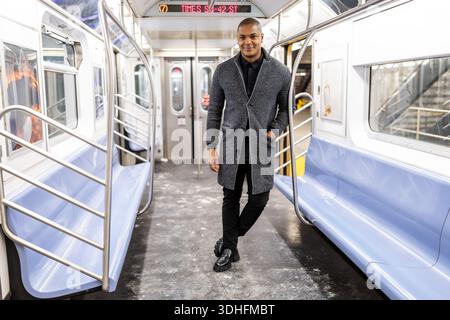 Stylish man commuting on new york city subway Stock Photo