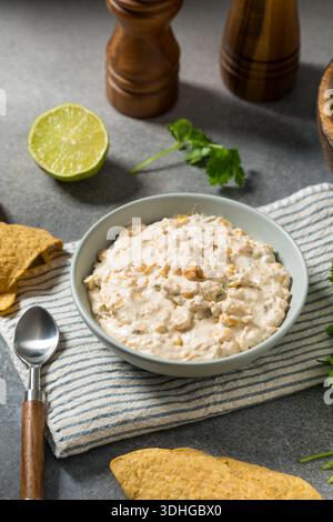 Creamy Sweet Corn Salsa Dip with Mayo and Chips Stock Photo