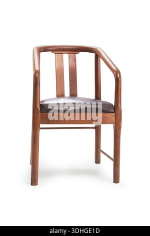 A classic wooden armchair with a smooth curved frame and a dark padded seat, featuring a simple and timeless design, isolated on a white background Stock Photo