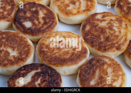 Detailed view showing porous crumb and shiny oil layer, Macro image capturing textured pancake surface with caramelization and glossy finish Stock Photo