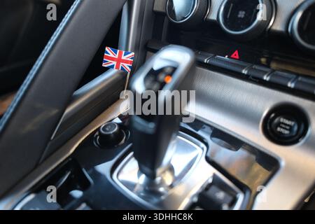 Recognisable brand (Jaguar), identifiable car interior design, strong editorial and illustrative use tied to national identity and branding. Stock Photo
