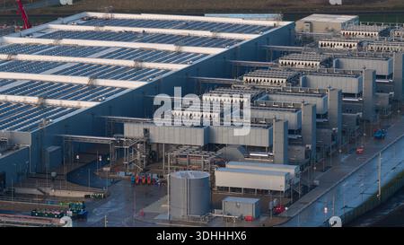 Data center building featuring solar panels and advanced cooling systems Stock Photo