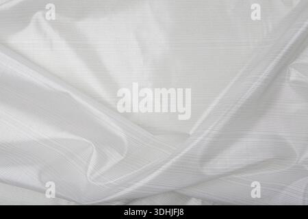 Shiny white striped fabric Stock Photo