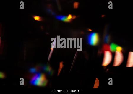 Colored light effects on dark background with grain and magic lights. Neon Glow Modern 90s, lo-fi Aesthetics. Design effect. Stock Photo