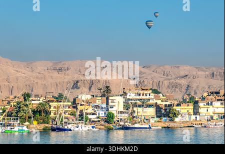 Hot air balloons over the landscape on the Nile near Luxor Stock Photo