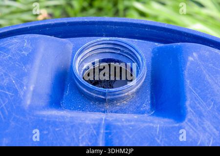 A large blue plastic tank of water. Stock Photo