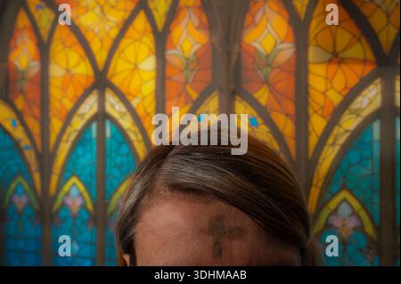 Ash Wednesday celebrations in church on stained glass window Stock ...