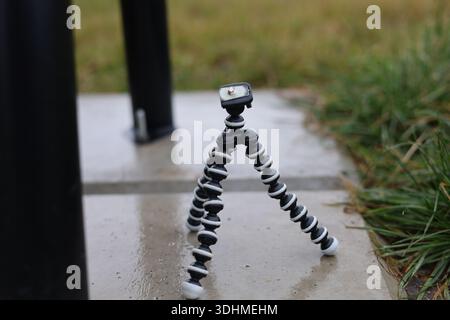 A mini flexible bendy camera tripod, photographers or filmmakers equipment Stock Photo