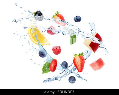 Fresh juicy fruits, berries and splashing water in air on white background Stock Photo