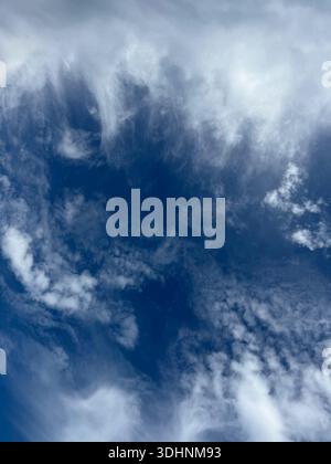 Fluffy clouds in th blue sky Stock Photo