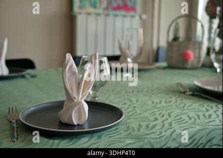 Decorated table served for Easter dinner Stock Photo