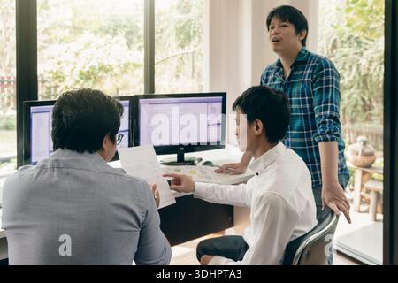 Programmers team working in a software developing. Developing programming and coding technologies. Website design. Cyber space concept. Stock Photo