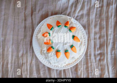 Top view of decorated by carrot easter cake. Stock Photo
