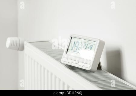 Programmable Thermostat for Home Heating and Cooling Control Stock Photo