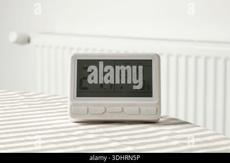 Programmable Thermostat for Home Heating and Cooling Control Stock Photo