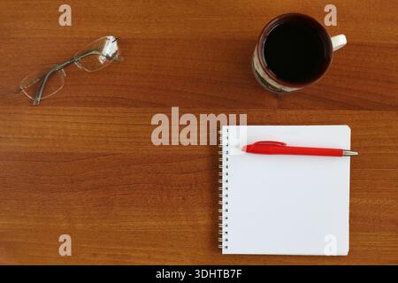 notebook and pen on wood. Office desk concept Stock Photo