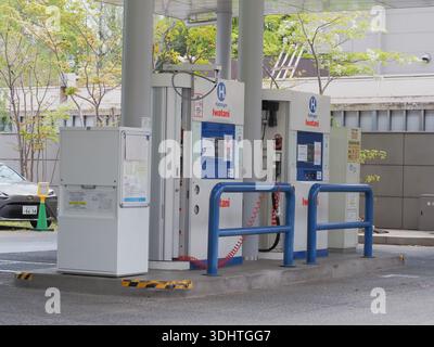 TOKYO, JAPAN - April 16, 2024: Hydrogen fueling pumps on the forecourt of an Iwatani Hydrogen Filling Station in Tokyo's Minato Ward. Stock Photo