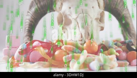 Displaying skull with curved horns resting behind bright candies on white table with binary overlay Stock Photo