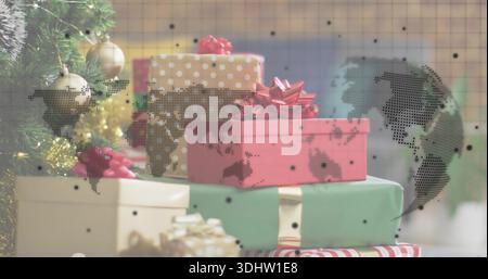 Displaying stacked wrapped gifts resting on mantle in family room, showing dotted world map overlay Stock Photo