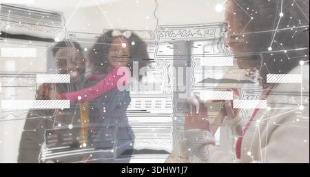 Holding smartphones, family posing for selfie at home in denim overalls, light sweater, HUD overlay Stock Photo
