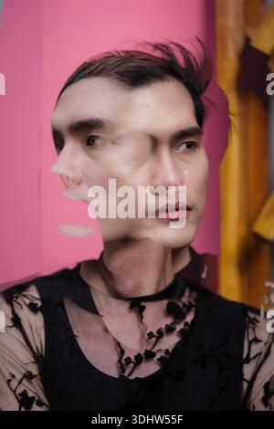 Young men moving his head with multi shoot. Stock Photo