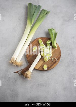 whole-and-cut-fresh-leeks-on-white-background-stock-photo-alamy