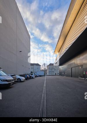 Metallic Waves: The Iconic Rippled Aluminum Facade of the Messe Basel Exhibition Hall, Basel, Switzerland Stock Photo