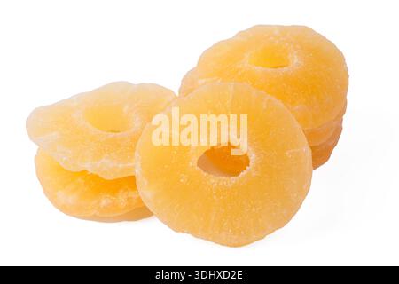 Dried pineapple slices on a white background. Stock Photo