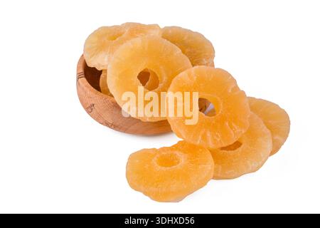 Dried pineapple slices on a white background. Stock Photo