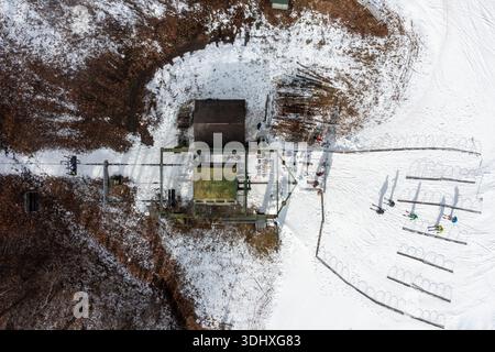 Aerial View Top Down of People Getting on a Ski Lift at Wintergreen Resort Stock Photo