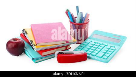 Homework. Stack of colorful notebooks, apple, calculator and different stationery isolated on white Stock Photo