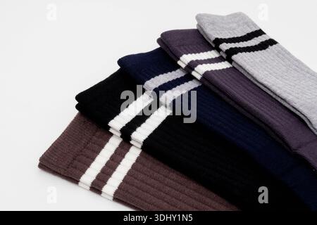 Set of colorful striped socks in various shades and patterns Stock Photo