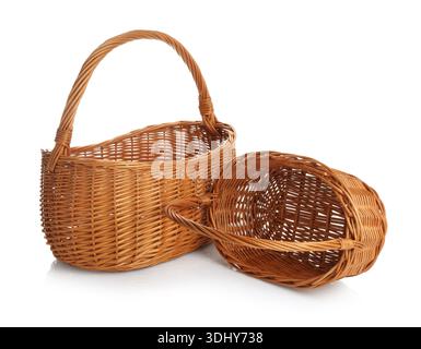 Two empty wicker baskets isolated on white Stock Photo