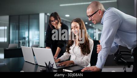 Diverse Group Of Software Programmers Collaborating In Extreme Coding Office. A Man Stock Photo