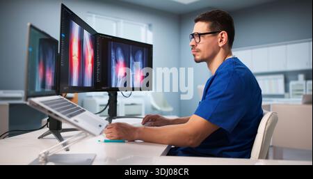 Surgeon Examining Knee X-ray Scan Using Software Technology At Hospital. Stock Photo