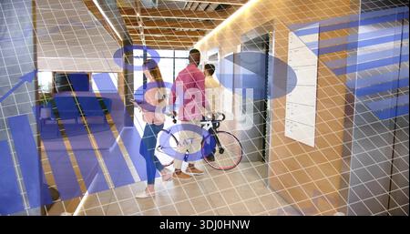 Standing man in pink shirt holding bicycle, woman in jeans holding helmet near elevator under AR Stock Photo