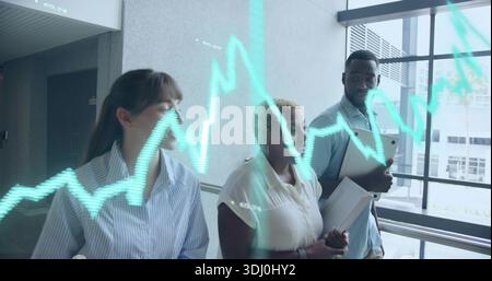 Walking three colleagues in shirts discussing data in office with laptop folder, turquoise overlay Stock Photo