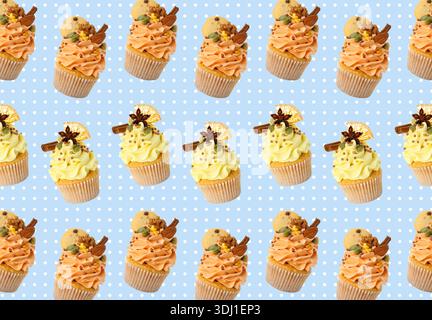 Pattern of tasty cupcakes on light blue background with polka dots Stock Photo