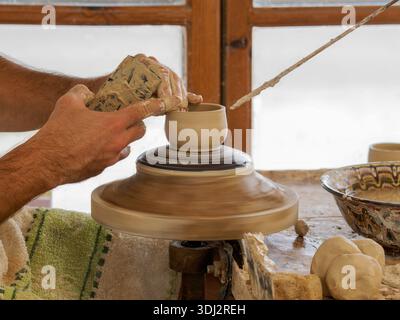 Master Potter Centering Clay on the Wheel – Intimate Pottery Moment Stock Photo