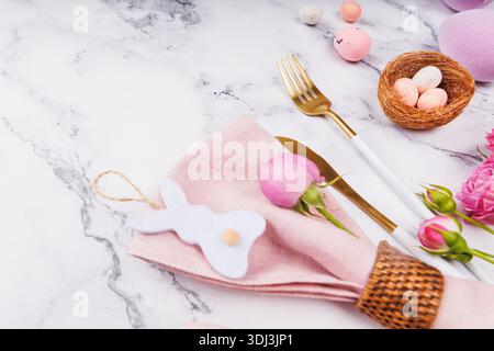 Easter Tabletop Scene with Bunny Decor and Roses Stock Photo